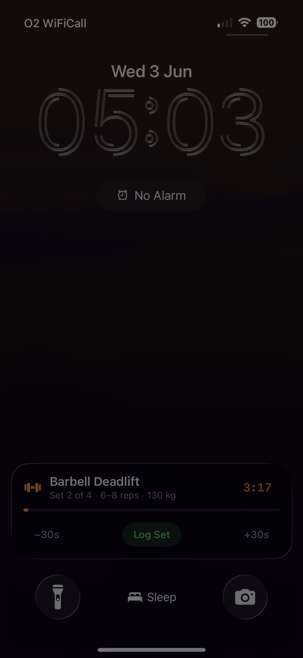 SteelRep Live Activity on the Lock Screen — rest timer countdown with Log Set and skip controls